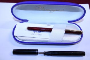 A vintage Messenger fountain pen and a Watermans fountain pen