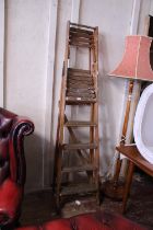 A vintage pair of of Lewis's Standex wooden ladders. No Shipping