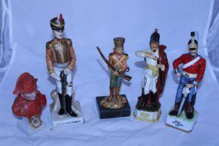 Five ceramic military figurines