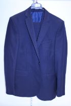 A Moss London suit complete with waistcoat and trousers