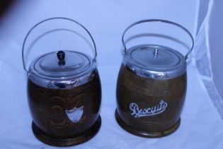 Two vintage wooden biscuit barrels with liners