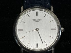 A men's Tissot T-Classic (needs battery)