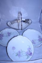 Three Limoges plates and a silver plated basket