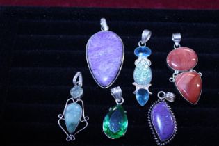 A selection of 925 silver pendants