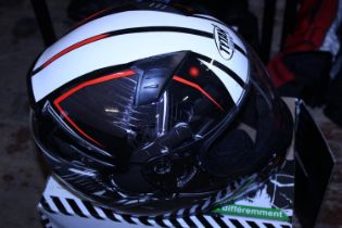 A boxed Titan Road motorcycle helmet size M