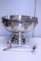 A quality silver plated 5 bottle wine cooler/punch bowl with removable inserts and ladles