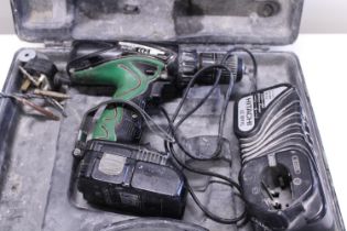 A Hitachi cordless drill with charger in working order. No shipping