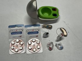 Two hearing aids and spare batteries untested