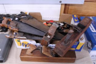 A box of woodworking tools including planes. No shipping