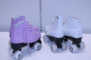 A new pair of pink children's roller-skates and another pair, slightly used, in white