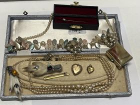 A good selection of vintage costume jewellery including pearls, Scottish brooches and rolled gold