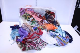 A large job lot of vintage and modern scarves including silk