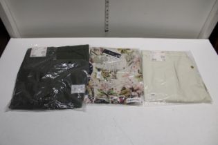 Three pieces of new with tags clothing