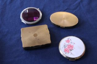 Four vintage compact mirrors