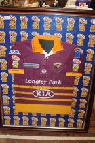 A framed and signed Huddersfield Giants Rugby League shirt, shipping unavailable