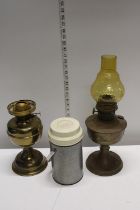 Two vintage brass oil lamps and a vintage Thermos glass, shipping unavailable