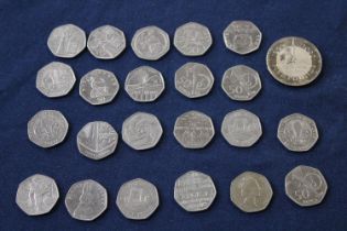 A selection of collectable 50p's and a £5 coin