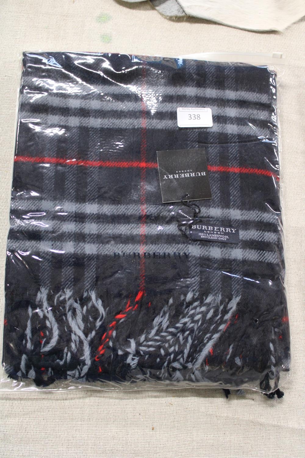 A new with tags Burberry 100% lambs wool Navy shawl 206 x 70cm