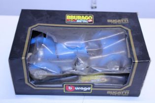 A boxed Bugatti Burago car model