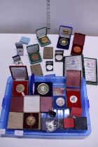 A job lot of assorted boxed medals and medallions etc