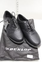 A new pair of Dunlop golf shoes size 11