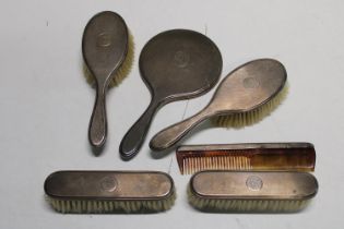 A selection of hallmarked silver dressing table items