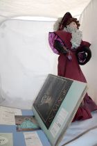 A Franklin Heirloom doll and scrapbook containing receipts and certs for all dolls Shipping