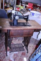 A Singer sewing machine table. No shipping