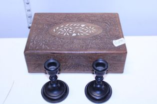 A Anglo-Indian carved box and two small Ebony candlesticks