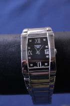 A Tissot Generosi - T ladies black dial stainless steel bracelet watch with spare links