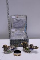 A boxed pair of oriental boxes in the form of enamelled birds