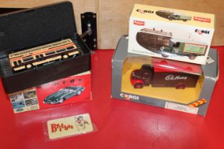 Four boxed assorted die-cast models