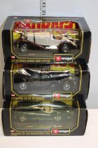 Three boxed Burago car models