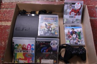 A PS3 console with power lead, controller and assorted games in working order