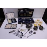 A job lot of assorted collectables including flatware, cutlery etc
