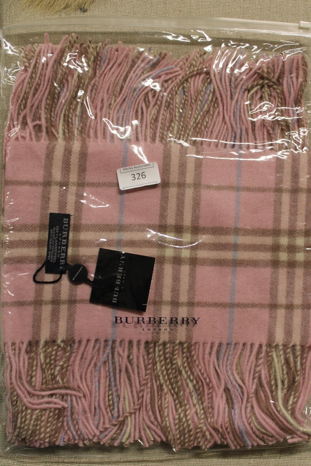 A new with tags Burberry 100% lambs wool pink long scarf with double tassels 150 x 37cm