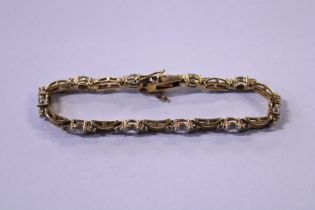 A Rolled Gold tennis bracelet