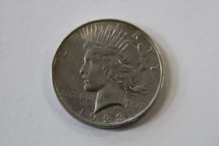 A 1923 silver American one dollar peace coin