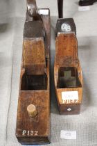 Two antique wood working planes one made by Hibernia of Sheffield