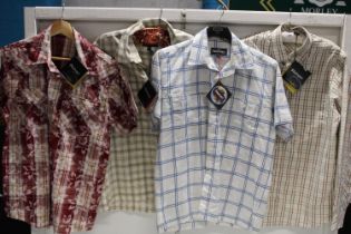 A selection of four new with tags Rohan shirts all sized S