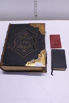 A Victorian family bible with brass mounts
