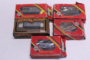 Five assorted boxed Hornby railway wagons