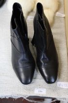 A new pair of ladies boots size 4.5