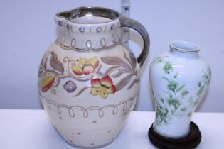 A large Charlotte Rhead jug and a Limoge vase on stand