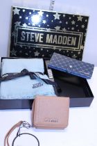 A boxed Steve Madden gift set and purse