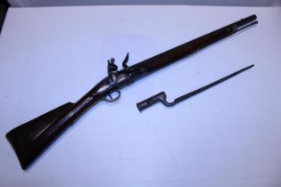 An antique brown Bess flintlock musket with proof marks for Birmingham approx 1850 and earlier