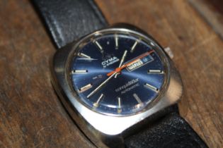 A gents Cyma Conquistador automatic wrist watch with blue dial, in working order