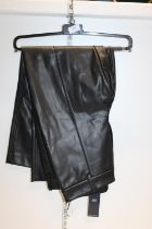 A new with tags M&S ladies leather look trousers size 14