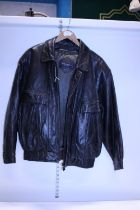 A Yves Saint Laurent vintage leather jacket size 95? with additional detachable inner lining.