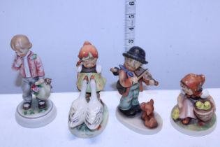 Four vintage Goebel's figures